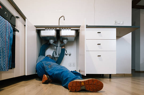 Professional Drain Cleaning technician working in Cassville, MO